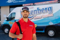 Rosenberg HVAC technician servicing residential air conditioning equipment, serving the San Antonio area.